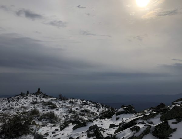 Sun over the summit, seen while hiking Mt Abraham in the Western Maine Mountains