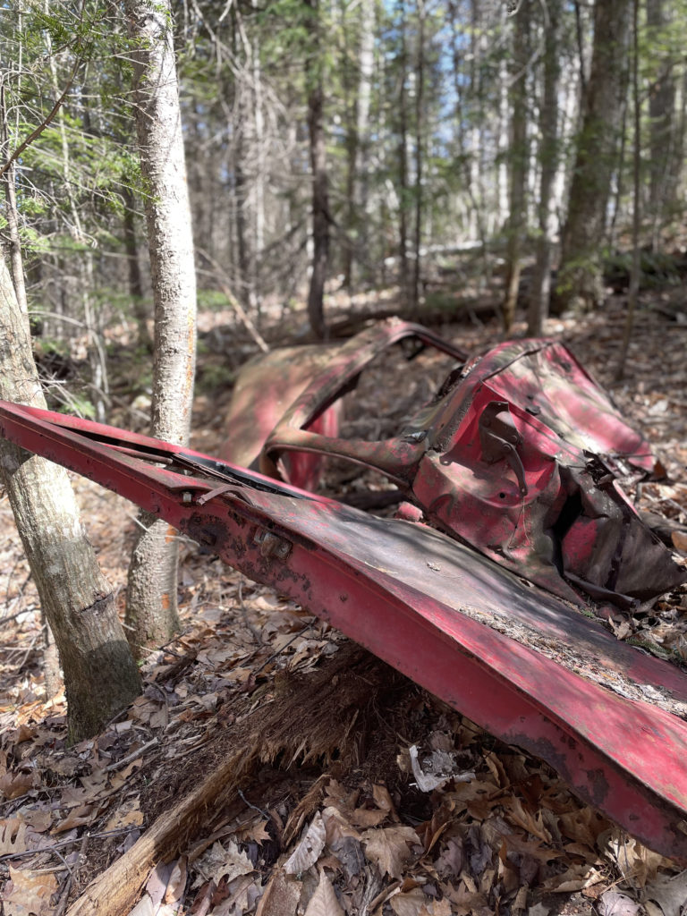 The remains of a rusty car, seen while hiking Mt. Moriah in the White Mountains, NH