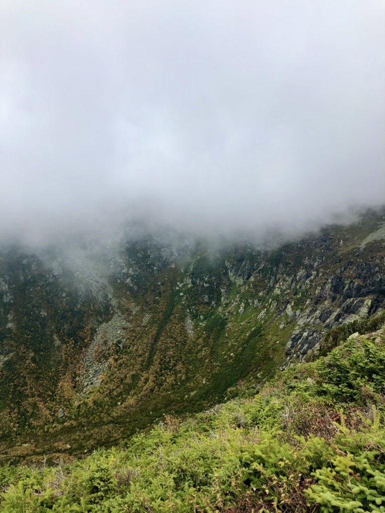 Fog rolling in seen while hiking Tuckerman Ravine, Mt. Washington, White Mountains, New Hampshire