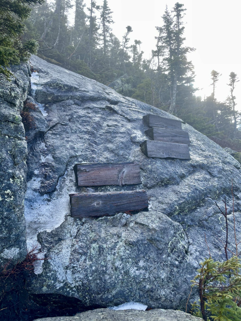 Steps on a boulder seen while hiking Wildcat Mtn in the White Mountains, New Hampshire