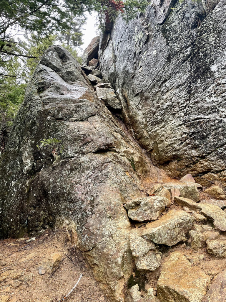 A steep rock chimney seen while hiking Wildcat Mtn in the White Mountains, New Hampshire