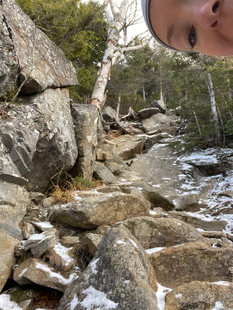 A person and a steep ascent, seen while hiking Wildcat Mountain ridge, White Mountains, New Hampshire