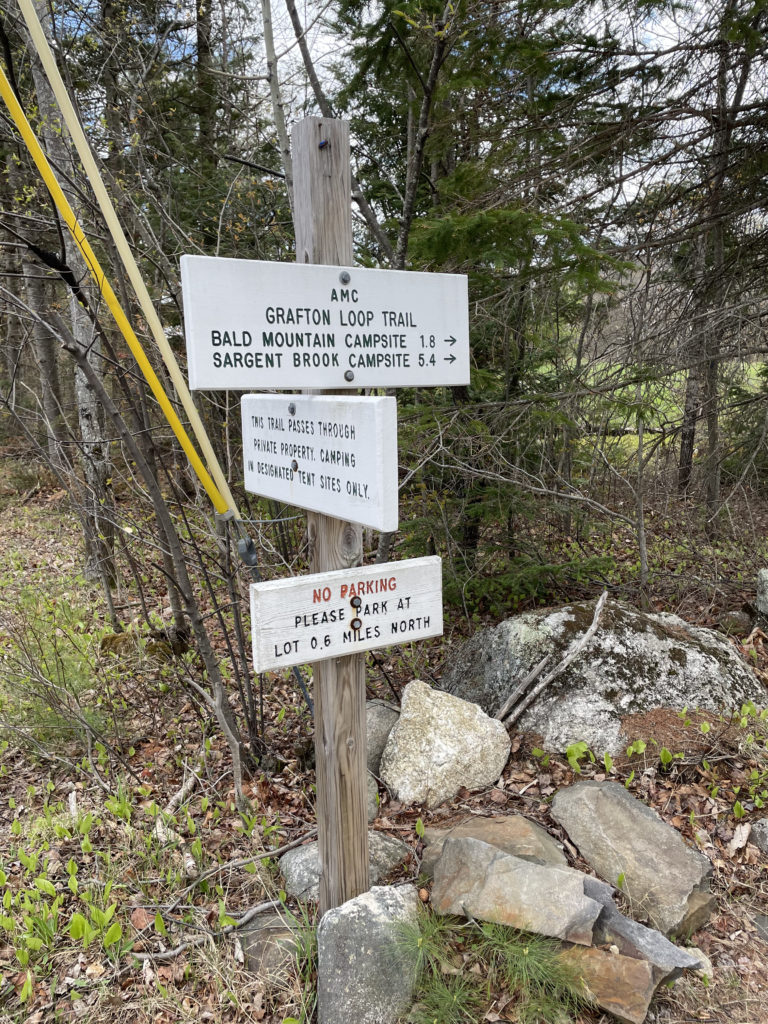 Trail sign seen while hiking and backpacking the Grafton Notch Loop Trail in the White Mountains, Maine