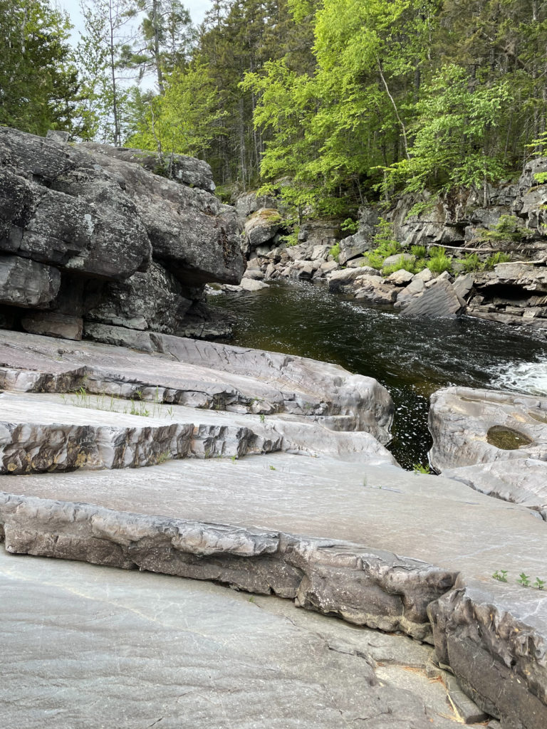Slabs of rocks at Gauntlet Falls in the KI Jo-Mary Forest, North Maine Woods