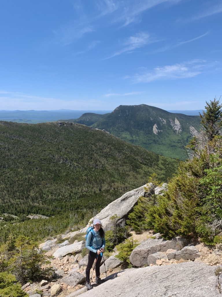 Standing on the granite slabs of Mt. Coe while hiking North Brother in Baxter State Park, Maine