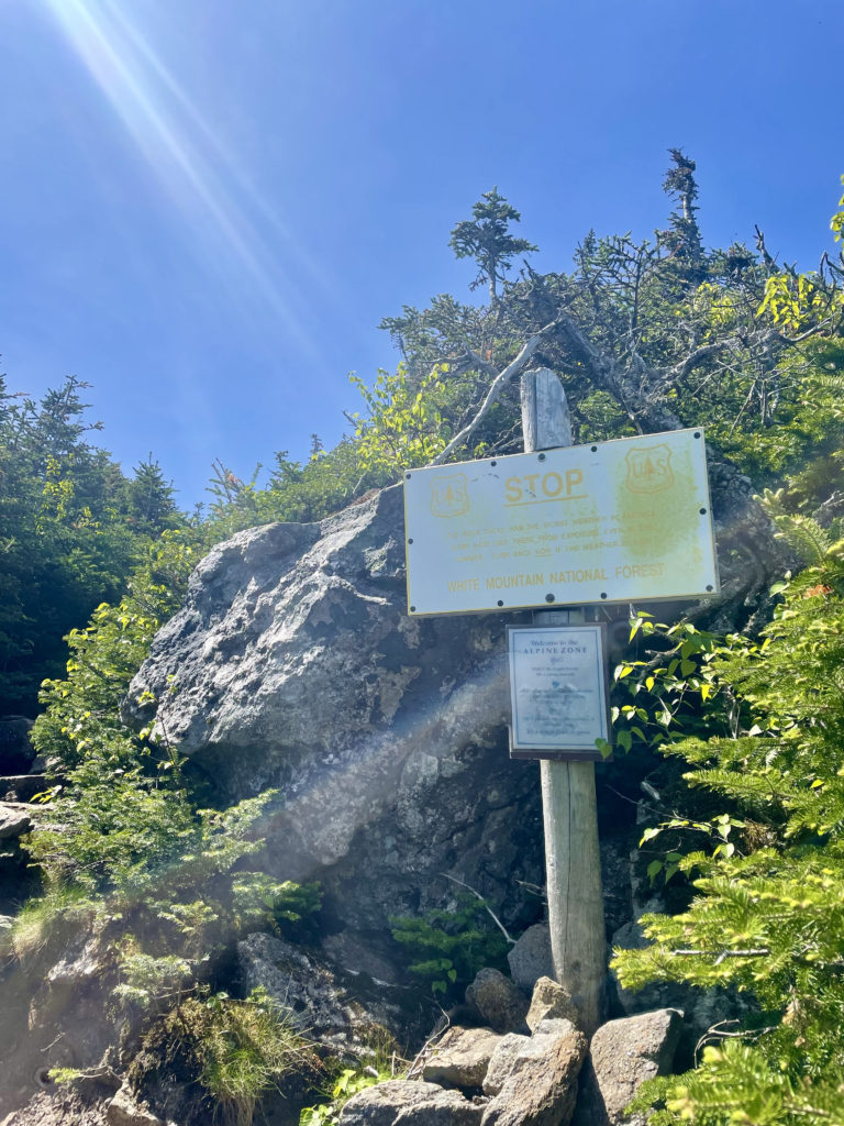 Sun faded alpine zine sign seen while hiking Mt. Madison in the White Mountain National Forest, New Hampshire