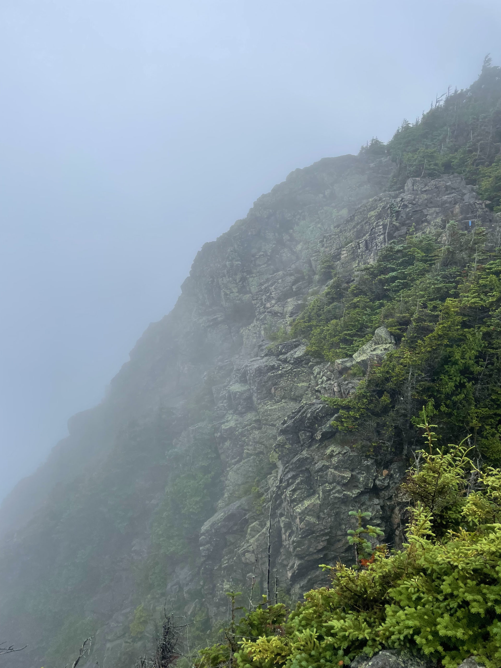 Franconia Ridge in the mist, seen while hiking Mt. Liberty and Mt. Flume on the Flume Slide Trail in the White Mountain National Forest, New Hampshire