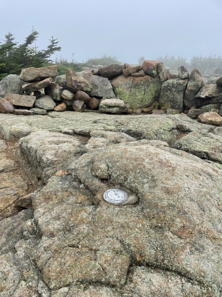 Mt. Bond summit marker, seen while hiking West Bond, Mt Bond, and Bondcliff in the White Mountains National Forest, New Hampshire