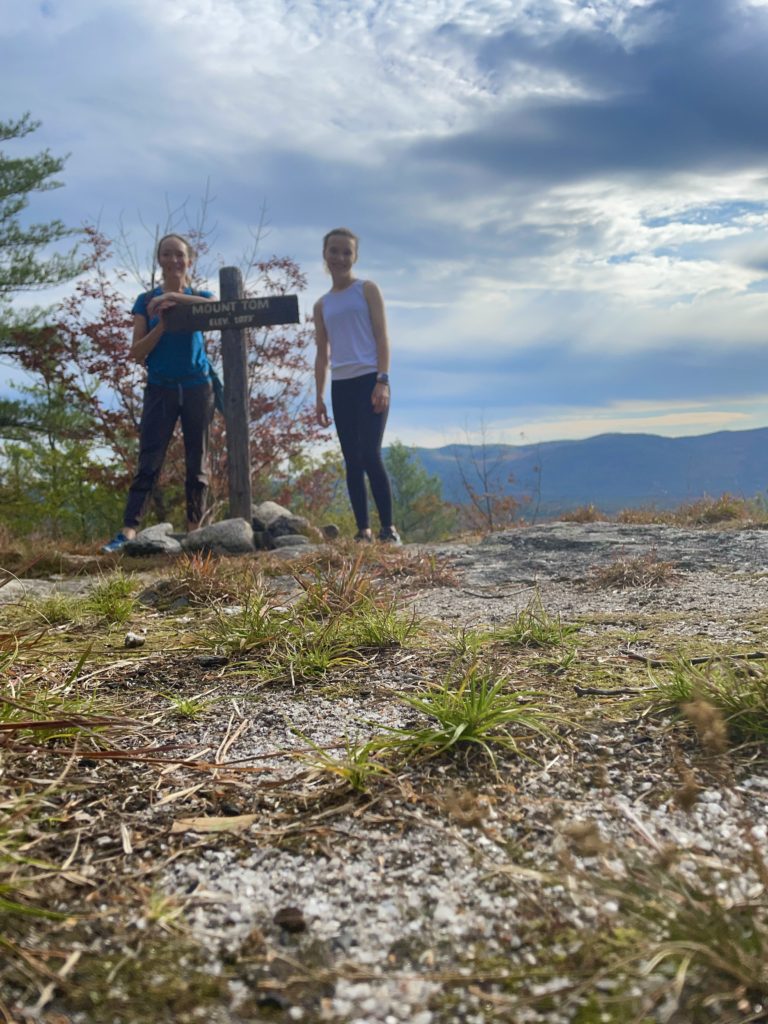 Hikers at the summit of Mt. Tom, Fryeburg, Maine