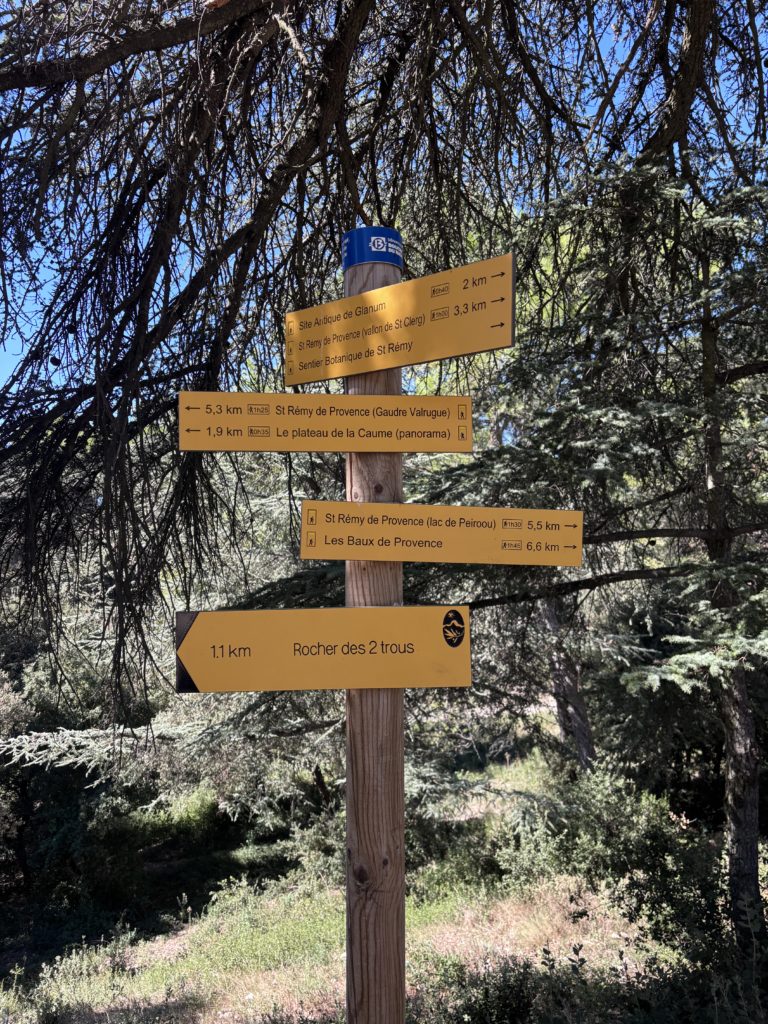 Trail signs in French on a trail in Saint Remi, France